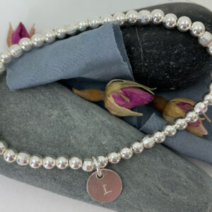 Personalised Initials Stretch bracelet plain and faceted recycled silver beads with initial disc charm