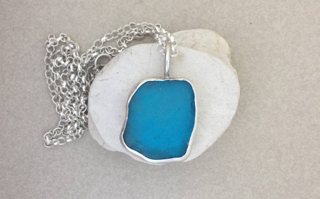 Bright blue sea glass and recycled silver pendant