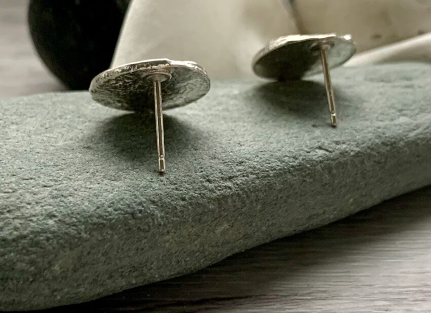 organic texture recycled silver textured stud earrings with rubies
