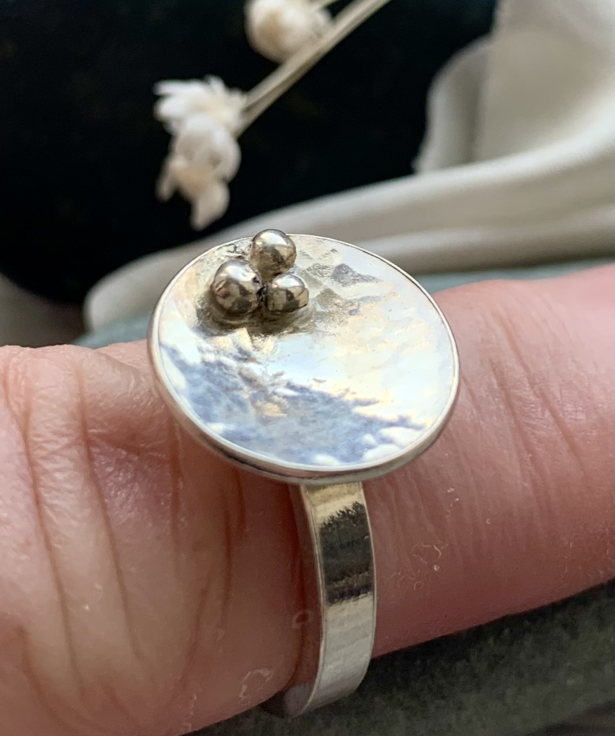 recycled sterling silver rockpool ring hammered texture three pebbles