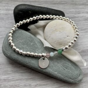 wellbeing bracelet healing beads silver beads personalised initial disc