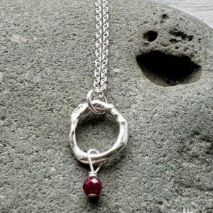 birthstone necklace recycled silver organic circle shape with ruby bead July birthstone