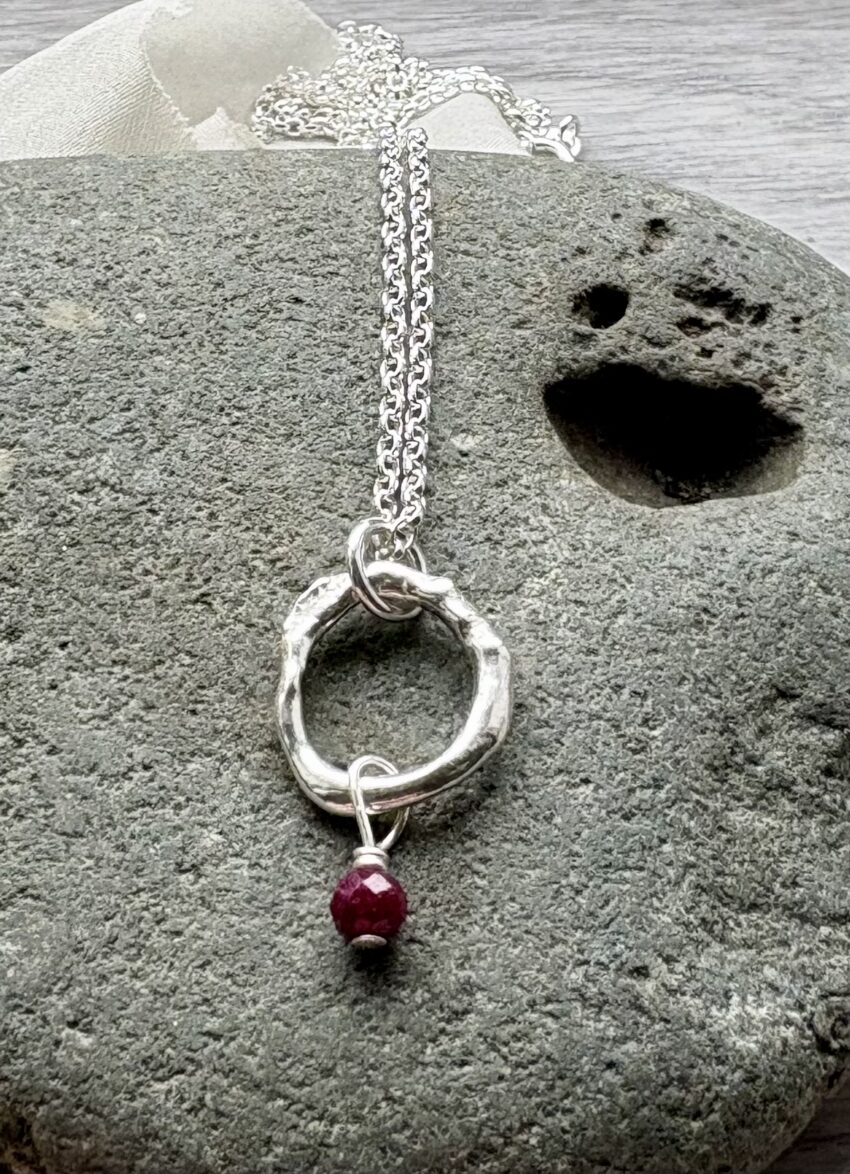 birthstone necklace recycled silver organic circle shape with ruby bead July birthstone