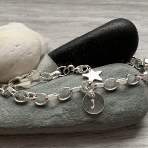 a bespoke silver chain charm bracelet